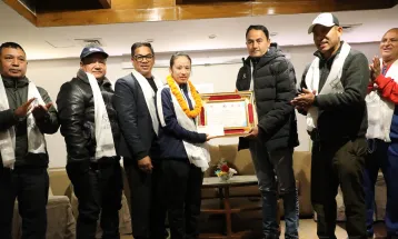 रेनु र लामा सम्मानित